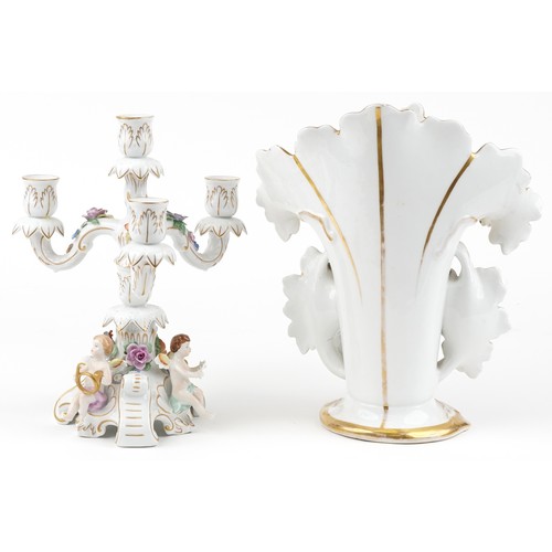 119 - A 20th century Sitzendorf porcelain candelabra with hand painted and gilded decoration, 31cm high, b... 