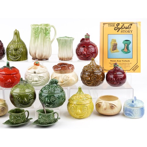 480 - A collection of Sylvac pottery face pots and covers, including tomato, onion and beetroot, variously... 