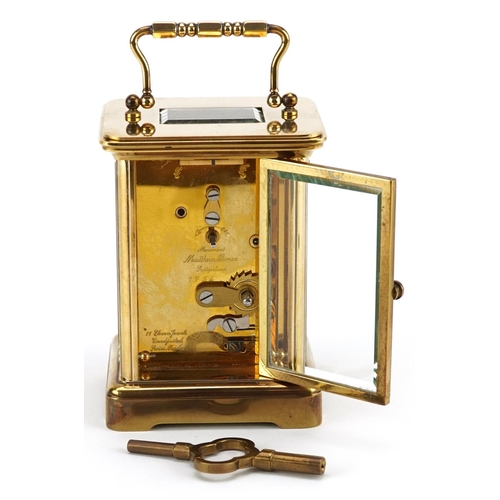 181 - A 20th century gilt brass carriage clock, the white enamelled dial with black Roman numerals, detail... 