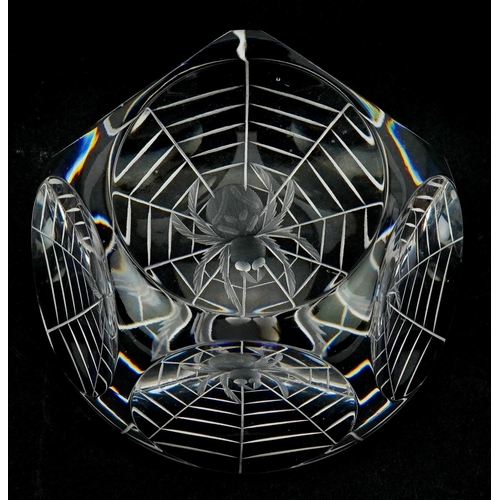 486 - A Webb Corbett crystal paperweight etched with a spider in a web to the base, 8cm in diameter.