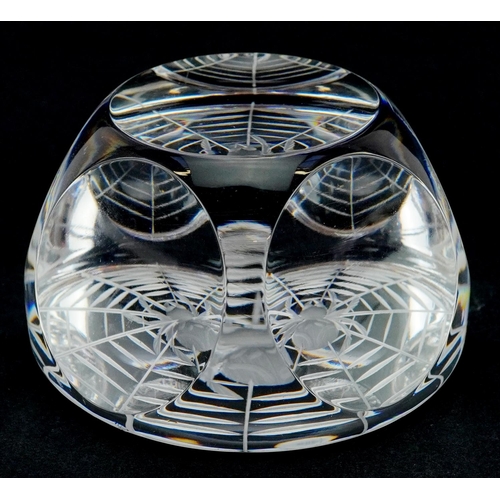 486 - A Webb Corbett crystal paperweight etched with a spider in a web to the base, 8cm in diameter.