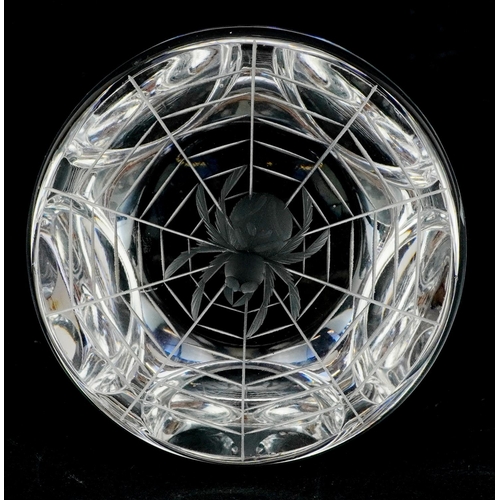 486 - A Webb Corbett crystal paperweight etched with a spider in a web to the base, 8cm in diameter.