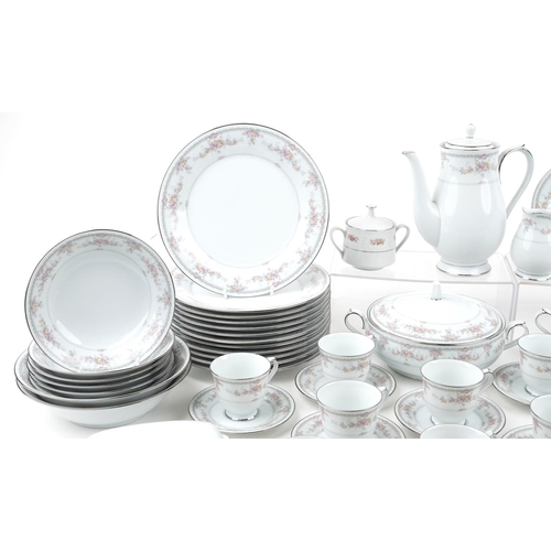 496 - An extensive Noritake Veranda porcelain dinner service.