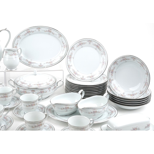 496 - An extensive Noritake Veranda porcelain dinner service.