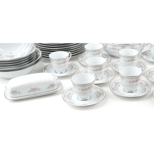 496 - An extensive Noritake Veranda porcelain dinner service.