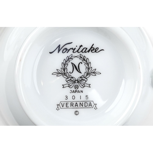 496 - An extensive Noritake Veranda porcelain dinner service.