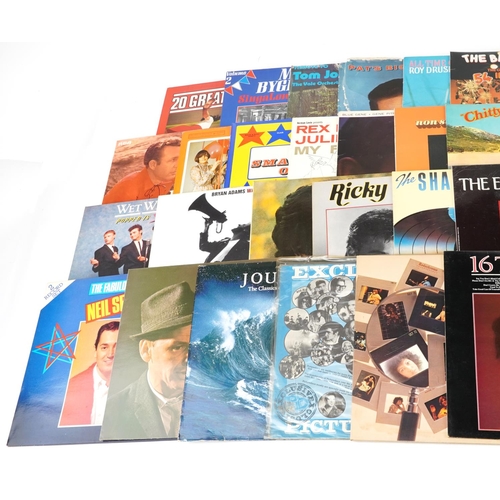 1056 - Vinyl LP records including David Essex, Jim Reeves, Shakin' Stevens, Elvis Presley, Madness, The Hol... 