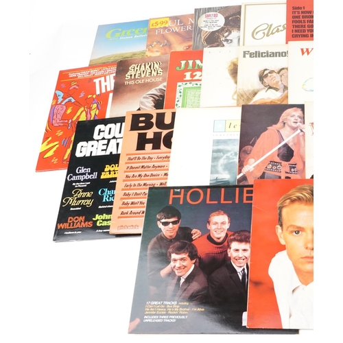 1056 - Vinyl LP records including David Essex, Jim Reeves, Shakin' Stevens, Elvis Presley, Madness, The Hol... 