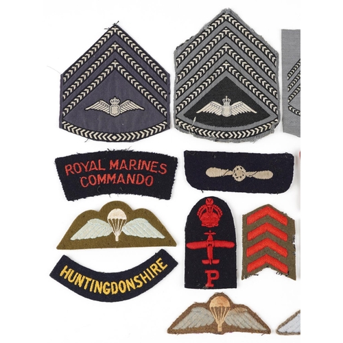 2463 - A collection of British military interest cloth patches.