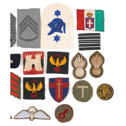 2463 - A collection of British military interest cloth patches.