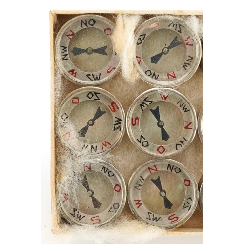 2492 - Twelve German military interest Luftwaffe escape compasses.