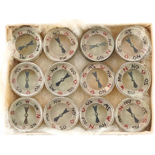 2493 - Twelve German military interest Luftwaffe escape compasses.