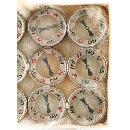 2493 - Twelve German military interest Luftwaffe escape compasses.