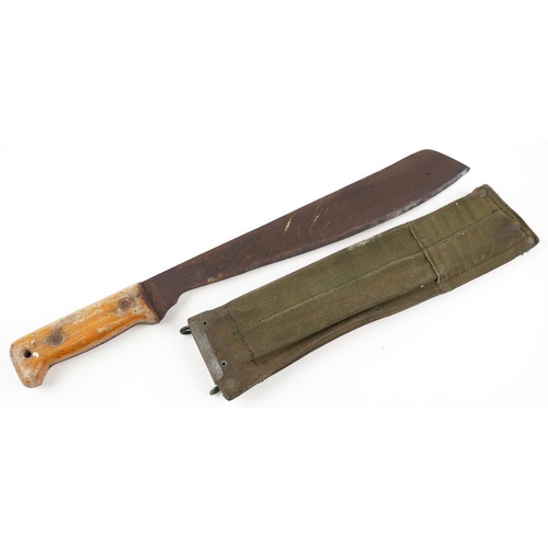 2539 - A vintage jungle machete with canvas sheath, 46cm in length.