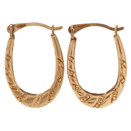 3153 - A pair of 9ct gold embossed hoop earrings, 1.9cm high, total 0.4g.