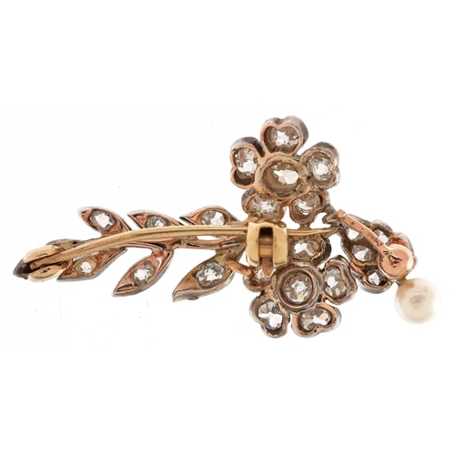 3159 - An antique unmarked gold diamond floral brooch with pearl drop, 3.6cm high, 2.8g.