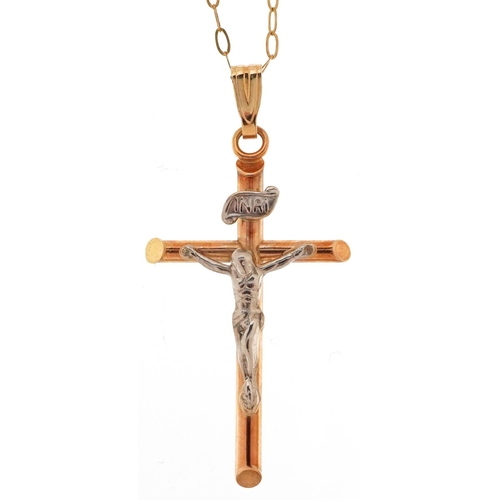 3449 - A 9ct two tone gold crucifix pendant on a 9ct gold necklace, 3.3cm high and 48cm in length, total 1.... 