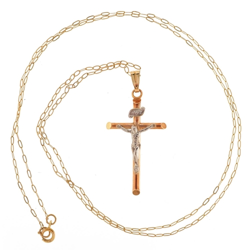 3449 - A 9ct two tone gold crucifix pendant on a 9ct gold necklace, 3.3cm high and 48cm in length, total 1.... 