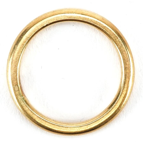 3052 - An unmarked gold wedding band, tests as 22ct gold, size N, 4.9g.