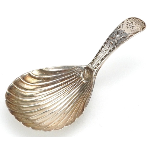 537 - A Georgian silver shell shaped caddy spoon, incomplete hallmarks, 8cm in length, 12.0g.