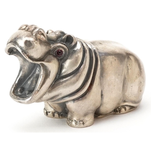 529 - A silver study of a hippopotamus with cabochon ruby eyes, impressed Russian marks, 7.5cm in length, ... 