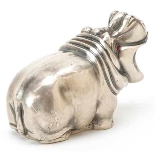 529 - A silver study of a hippopotamus with cabochon ruby eyes, impressed Russian marks, 7.5cm in length, ... 