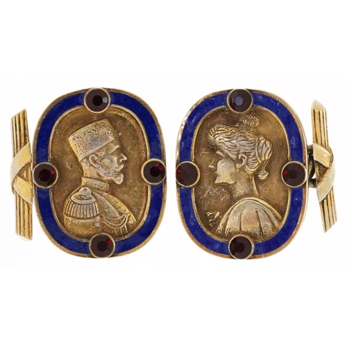 3175 - A pair of silver gilt and blue enamel portrait cufflinks set with red stones, impressed Russian mark... 