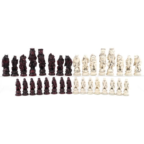 1341 - A decorative resin chess set in the form of animals, the largest piece 17cm high.