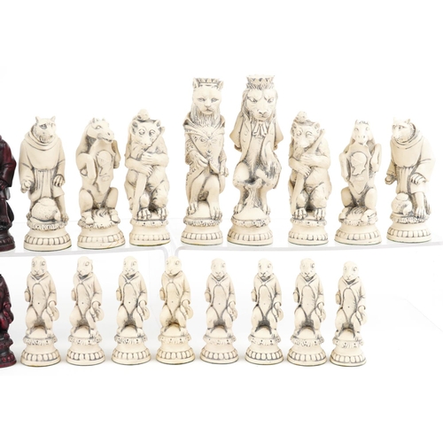 1341 - A decorative resin chess set in the form of animals, the largest piece 17cm high.