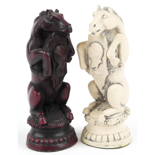 1341 - A decorative resin chess set in the form of animals, the largest piece 17cm high.