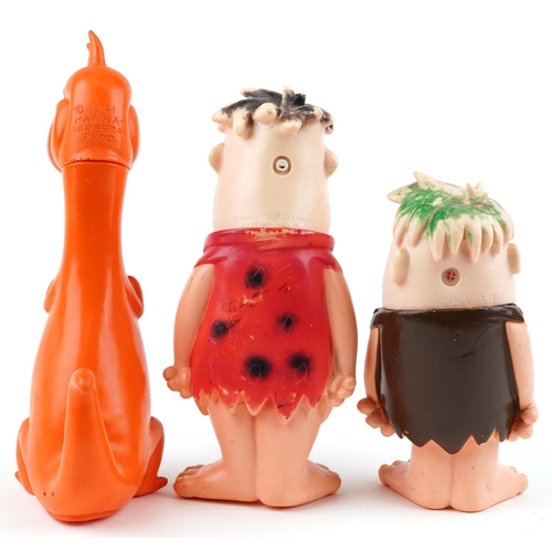  Three 1961 Flintstone toys by Hanna-Barbera comprising Fred, Barney and Dino, the largest 32.5cm hig... 