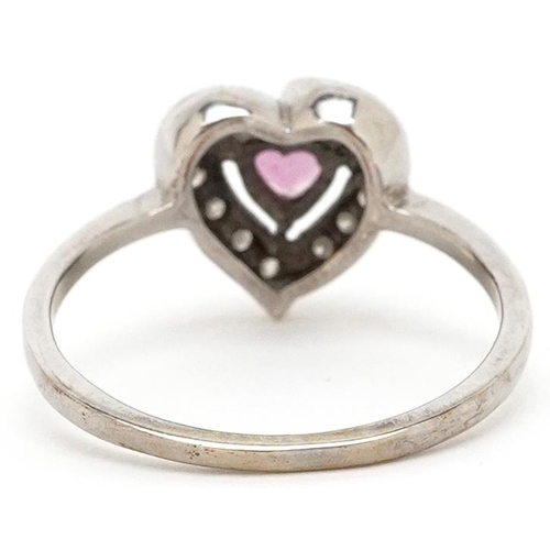 3156 - An unmarked white gold pink garnet and diamond love heart ring, size L, 2.1g.