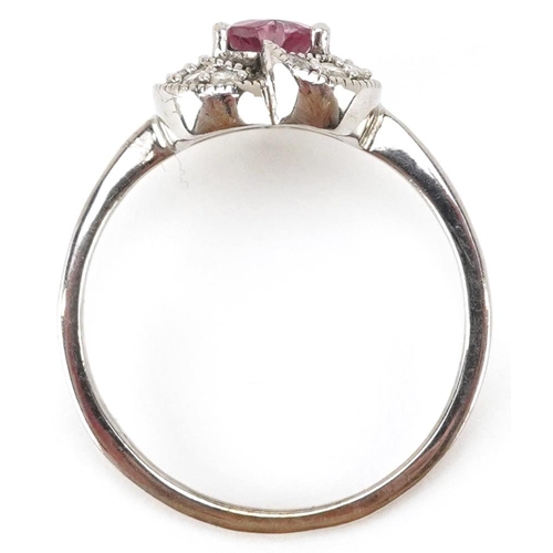 3156 - An unmarked white gold pink garnet and diamond love heart ring, size L, 2.1g.