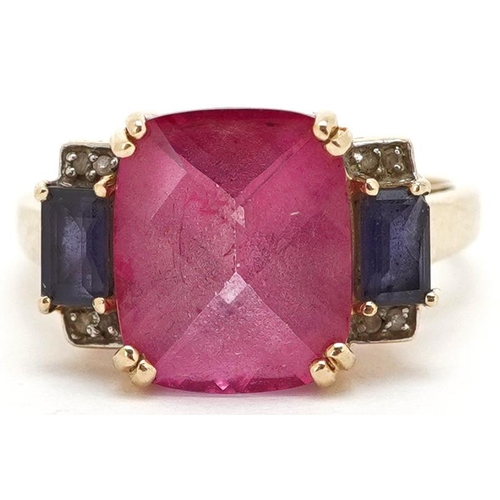 3150 - A 9ct gold Art Deco style pink topaz ring with diamond and iolite set shoulders, the topaz 12mm x 10... 