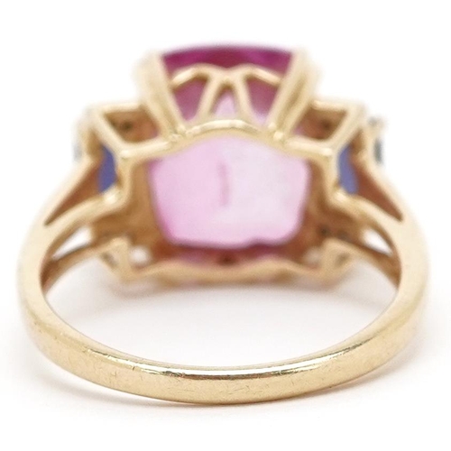 3150 - A 9ct gold Art Deco style pink topaz ring with diamond and iolite set shoulders, the topaz 12mm x 10... 