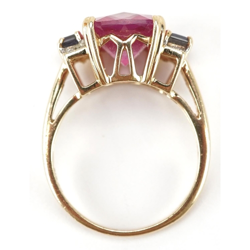 3150 - A 9ct gold Art Deco style pink topaz ring with diamond and iolite set shoulders, the topaz 12mm x 10... 