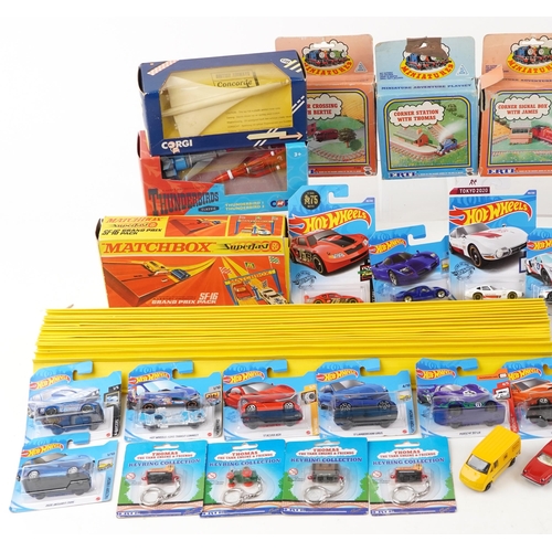 518A - Vintage and later collectable toys, some with boxes, including Matchbox diecast vehicles, Ertl Thoma... 