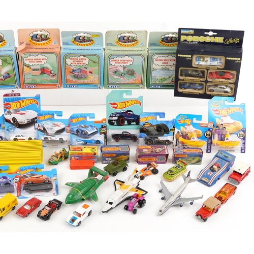 518A - Vintage and later collectable toys, some with boxes, including Matchbox diecast vehicles, Ertl Thoma... 