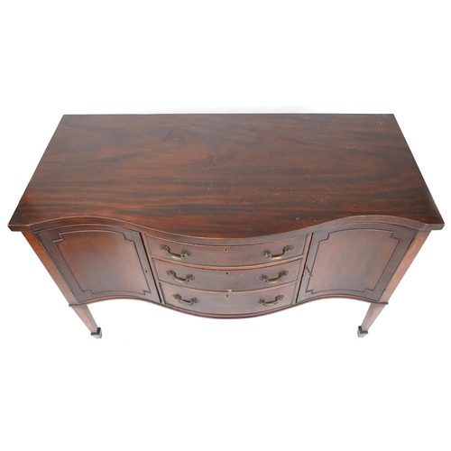 2037 - A late Victorian serpentine fronted mahogany sideboard fitted with three central drawers flanked by ... 