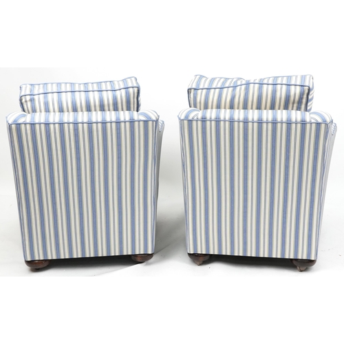 2005 - A mid 20th century George V three piece suite upholstered in striped blue fabric comprising a two se... 