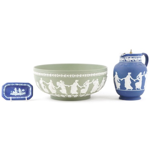 1212 - A Wedgwood green Jasperware circular bowl decorated with classical figures, 26cm in diameter, togeth... 