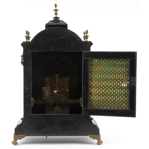  A large ebonised and gilt metal mounted mantle clock, the silvered dial having black Roman numerals,... 