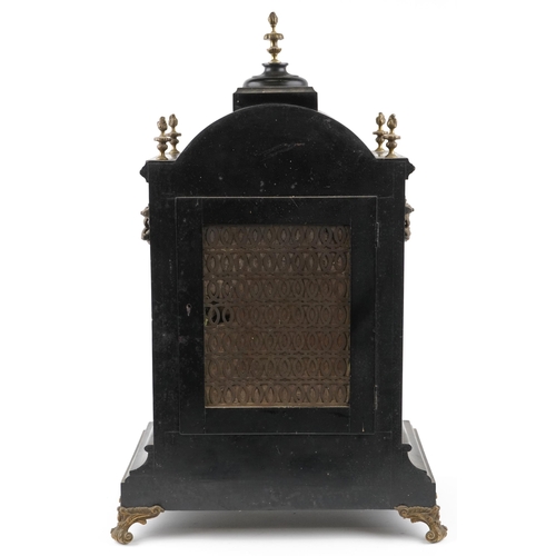  A large ebonised and gilt metal mounted mantle clock, the silvered dial having black Roman numerals,... 