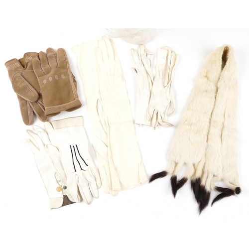 1015 - Three pairs of early 20th century ladies white leather gloves together with a white mink fur stole a... 