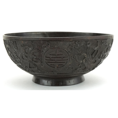 415 - A finely carved Chinese Coconut Bowl, late 19th/ early 20th century, the sides carved with intricate... 