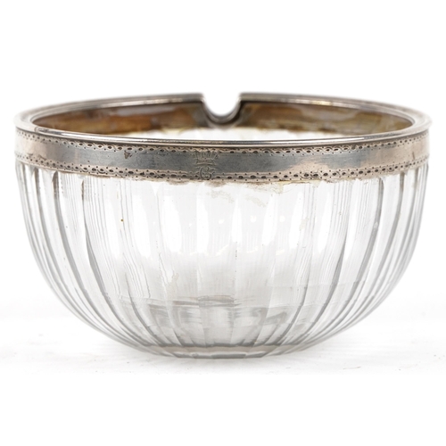 514 - A late Georgian glass and silver mounted sugar bowl, circa 1800, the bright cut and crested collar a... 