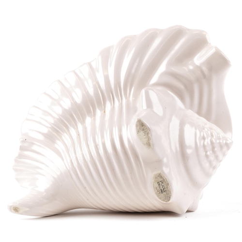 189 - A Poole Pottery novelty vase in the form of a conch shell, circa 1960, milk chocolate brown interior... 