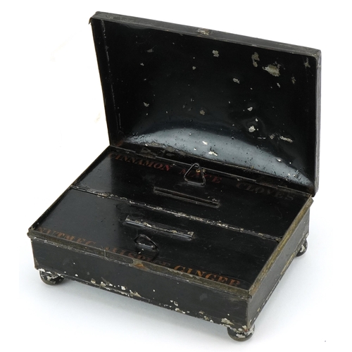 1141 - A late Georgian Japanned spice box, circa 1820, the slightly domed top opening to reveal two section... 