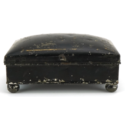 1141 - A late Georgian Japanned spice box, circa 1820, the slightly domed top opening to reveal two section... 