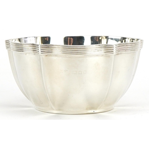 506 - An Edwardian silver sugar bowl, London 1901, worn makers marks, diameter 10cm, 89 grams.